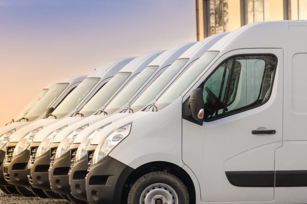 commercial delivery vans parked in row. Transporting service company.